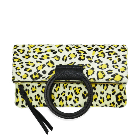 jolie clutch with handmade leather handles in citron leopard haircalf